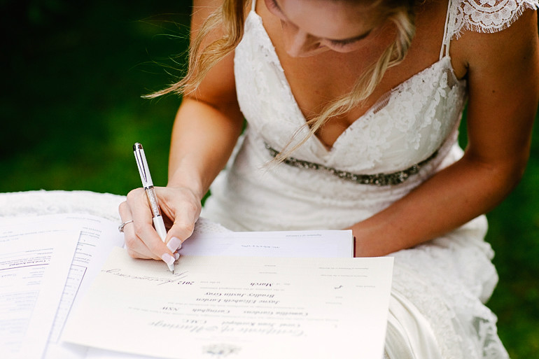 Jayne and Brad Wedding-Signing of the marriage certificate photo